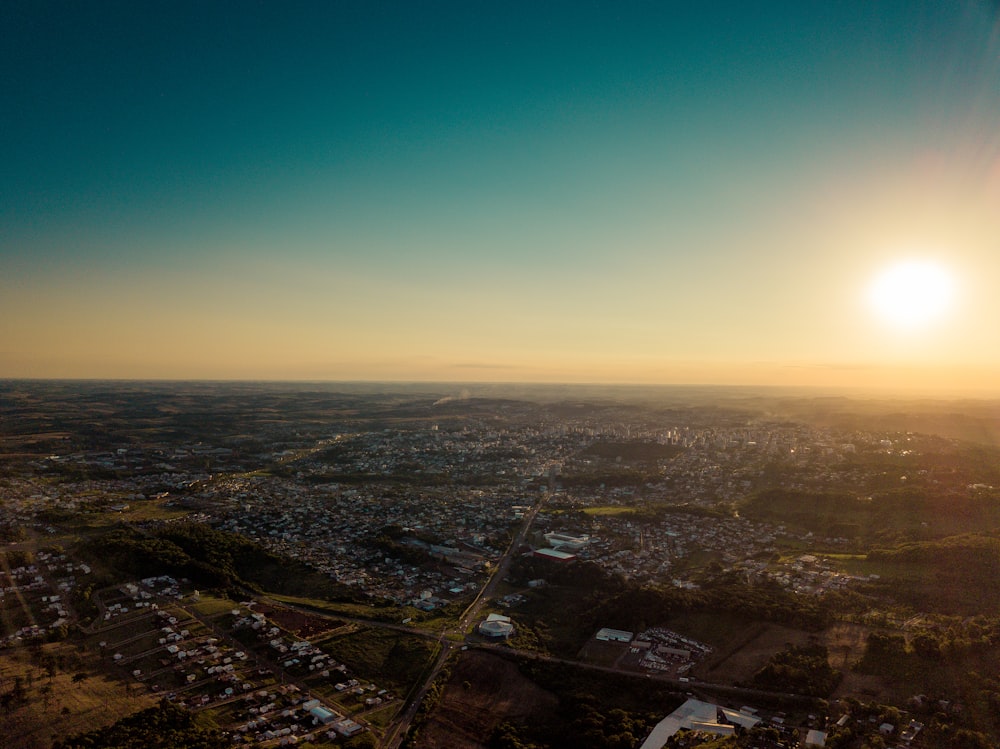 aerial photography of city high rise buildings under clear blue sky during daytime