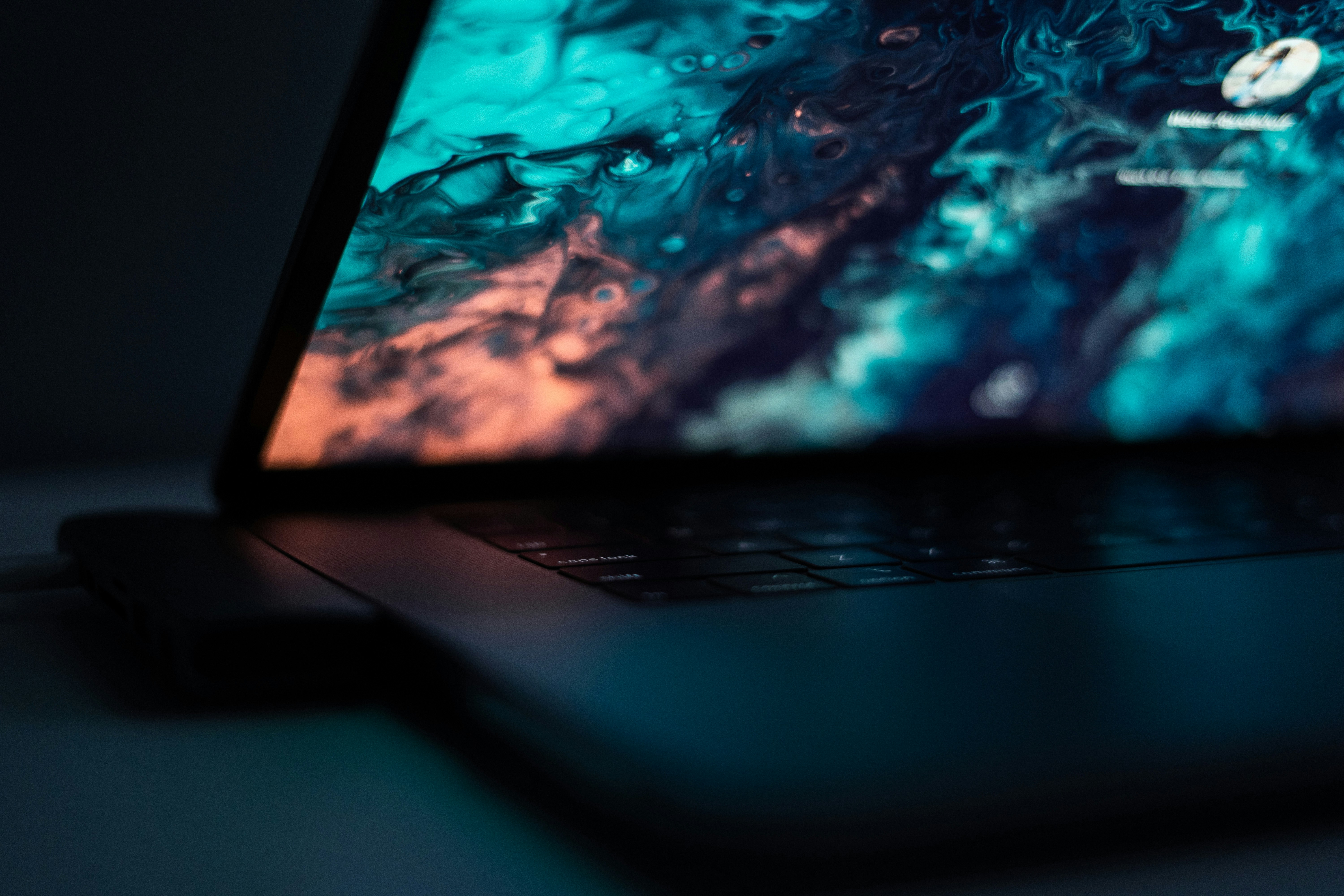 black MacBook displaying lock screen