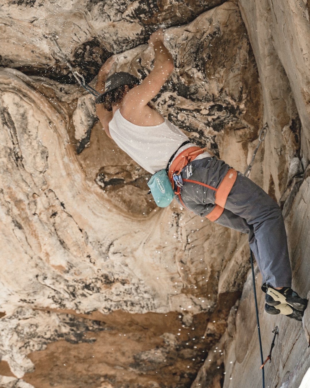 man doing rock climbing