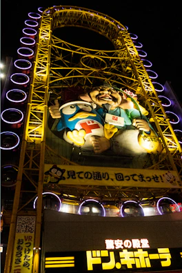 Sample interior page featuring the Tokyo Tower with playful penguin poses.