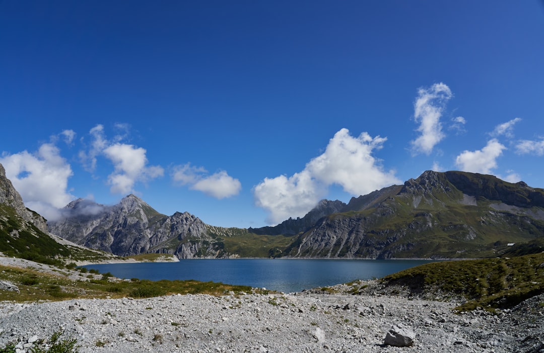 lake with mountains on sides