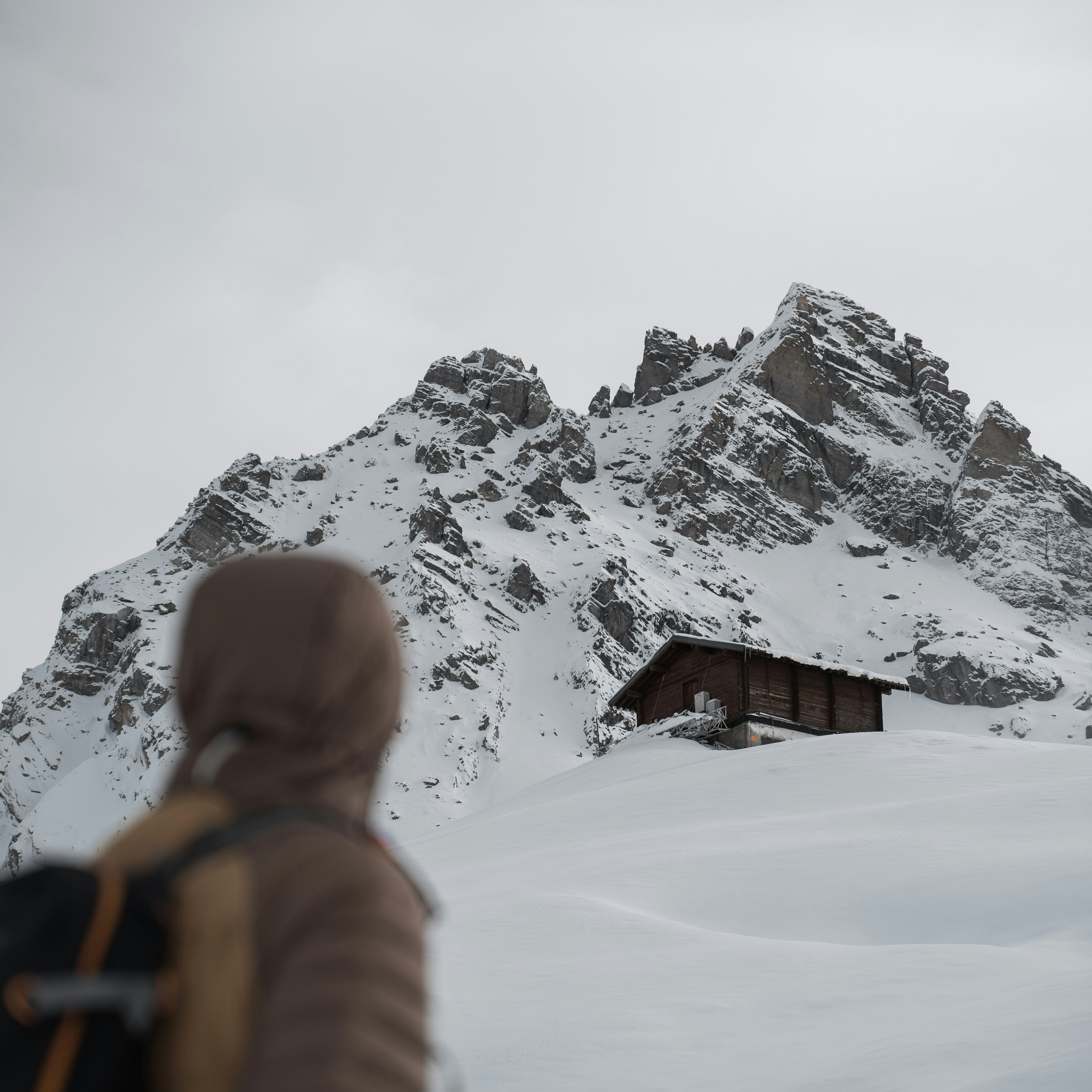 cabin on snow mountain