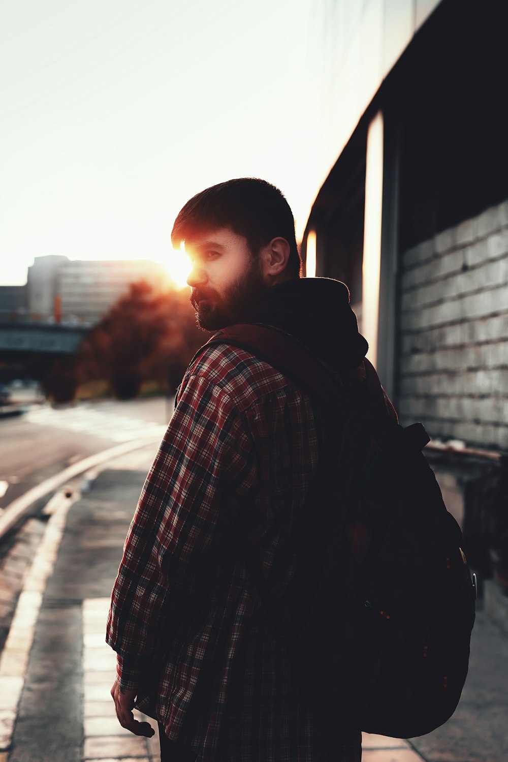 man wearing black backpack