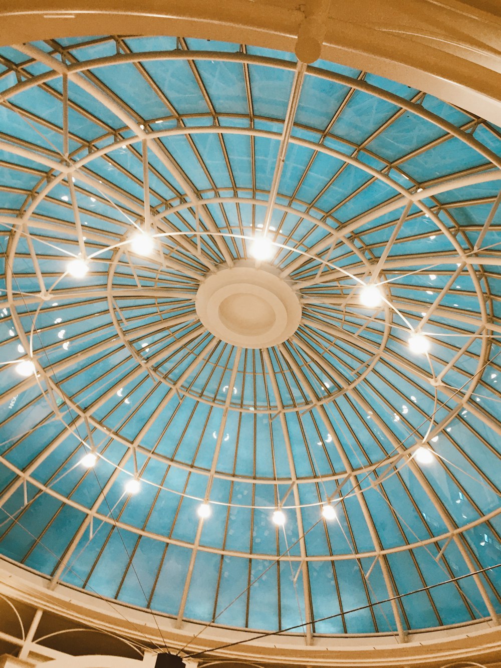 a domed glass ceiling in a building