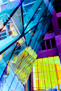Abstract architectural shot capturing the spirit of Casablanca in deep navy and gold hues.