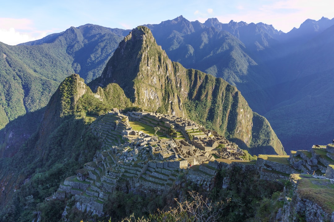 high angle photo of mountain, A completely empty Machu Picchu. I arrived there in the early morning and there was a trai