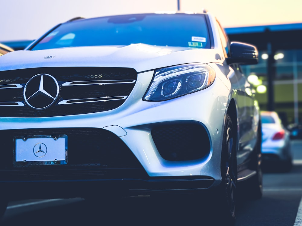 parked silver Mercedes-Benz car