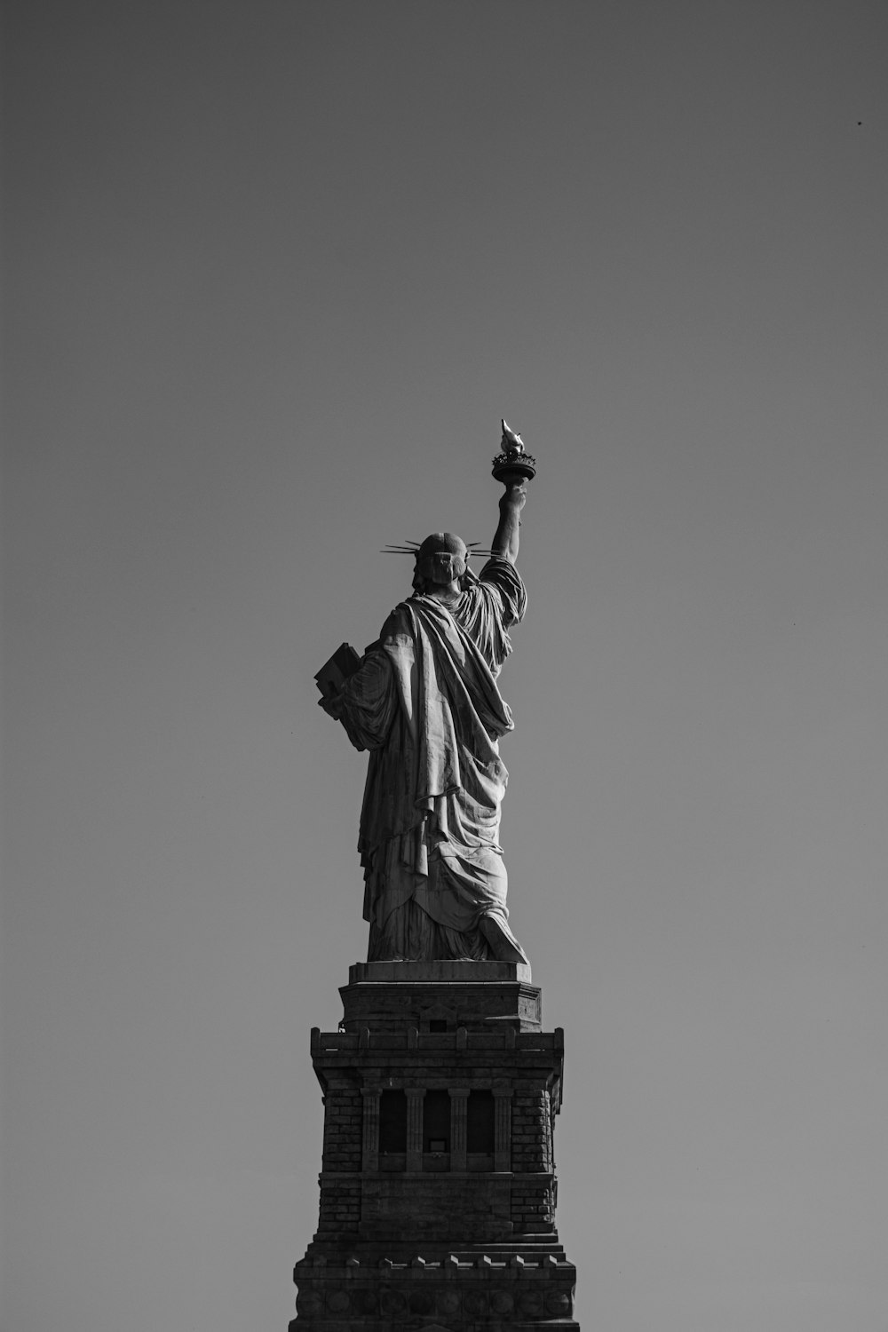 greyscale photo of Liberty Statue, New York