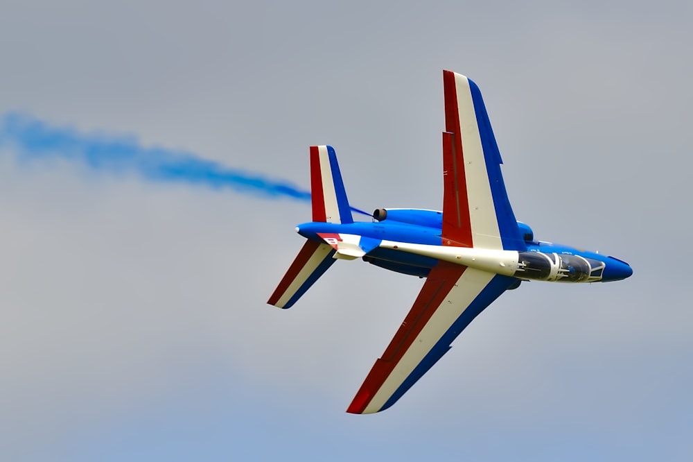 red,white, and blue airplane