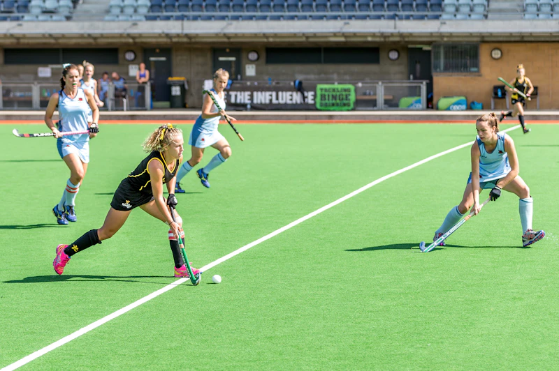 athletic woman playing on a sports field