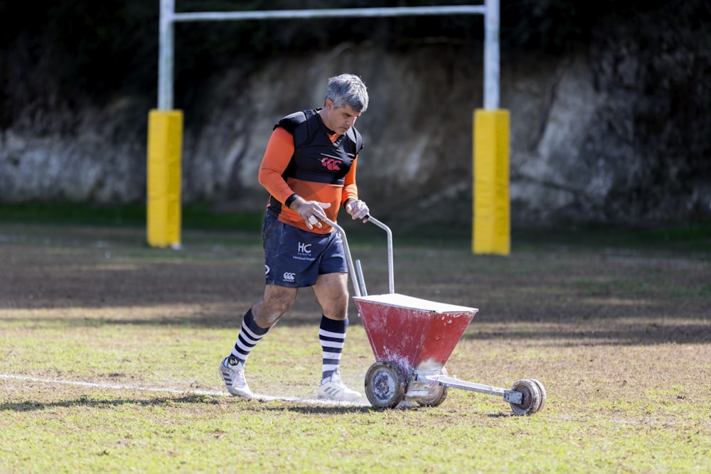 man painting the field