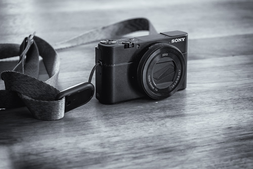 grayscale photo of Sony point-and-shoot camera