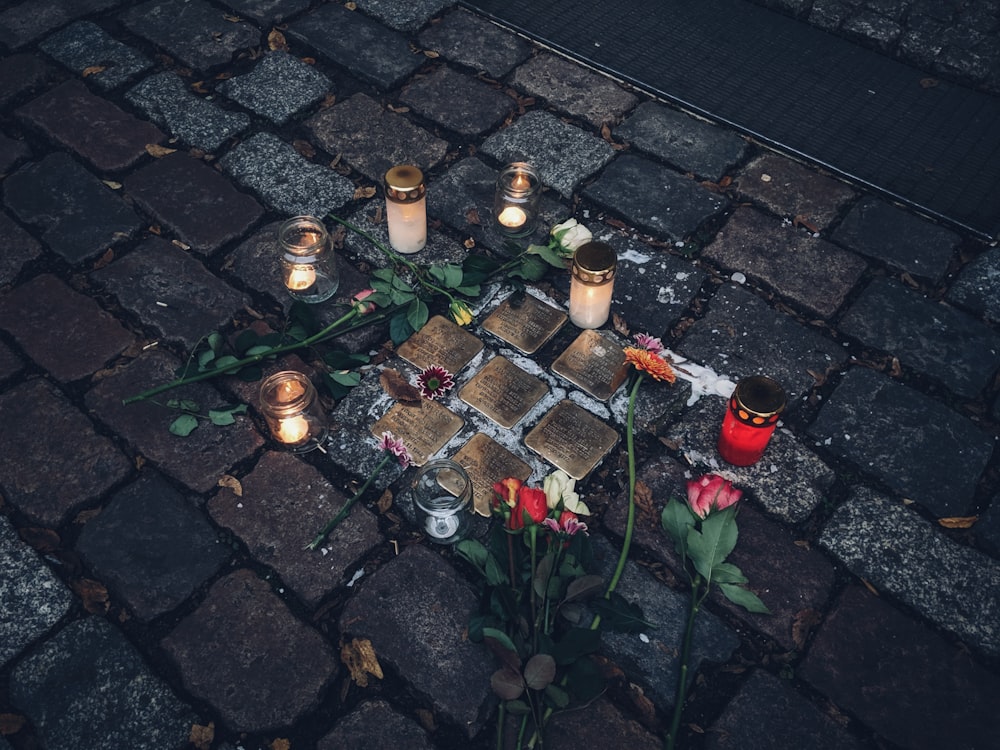 lit candles on ground