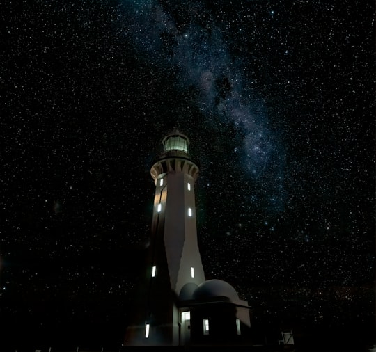 photo of white painted lighthouse in Green Cape Australia
