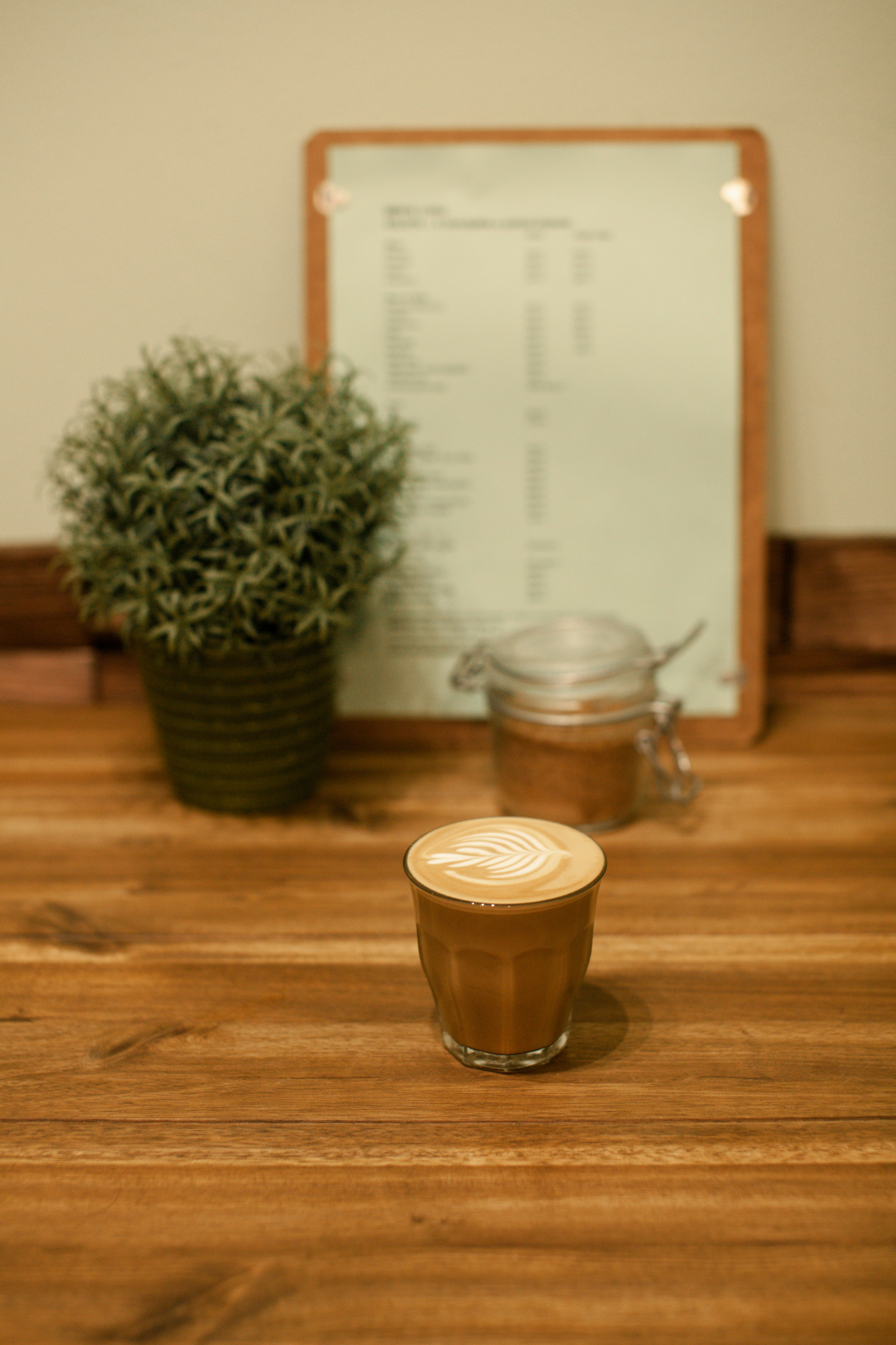 clear glass cup filled with coffee