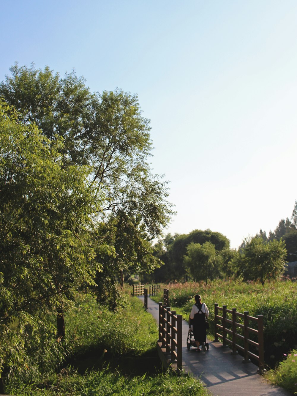 woman walking on bridge