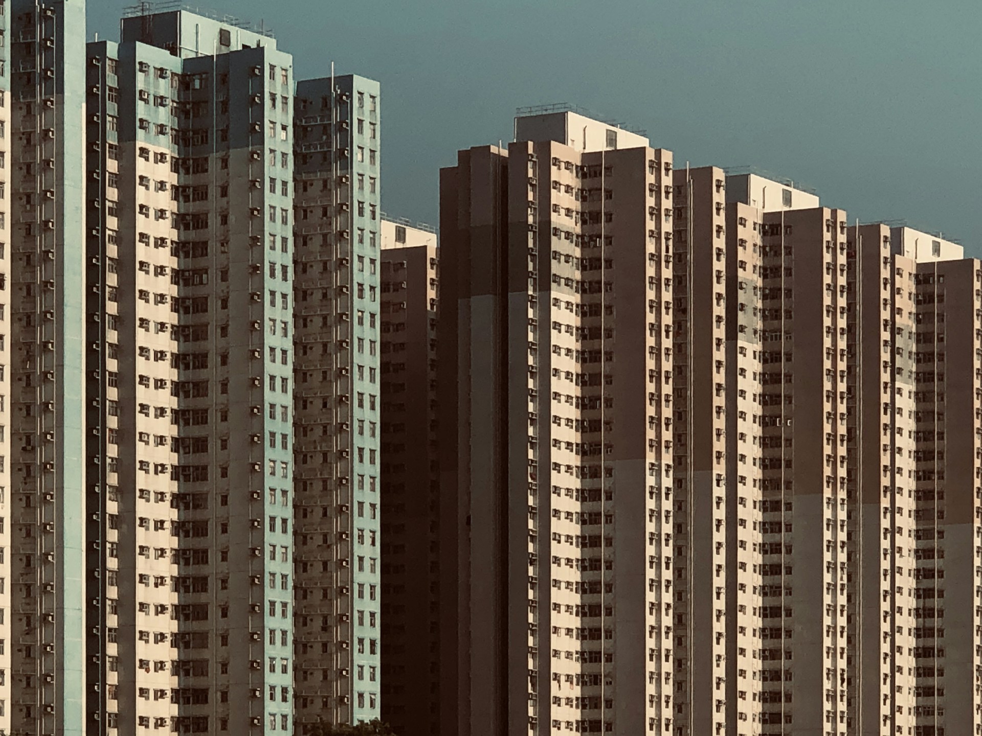 a large group of tall buildings next to each other