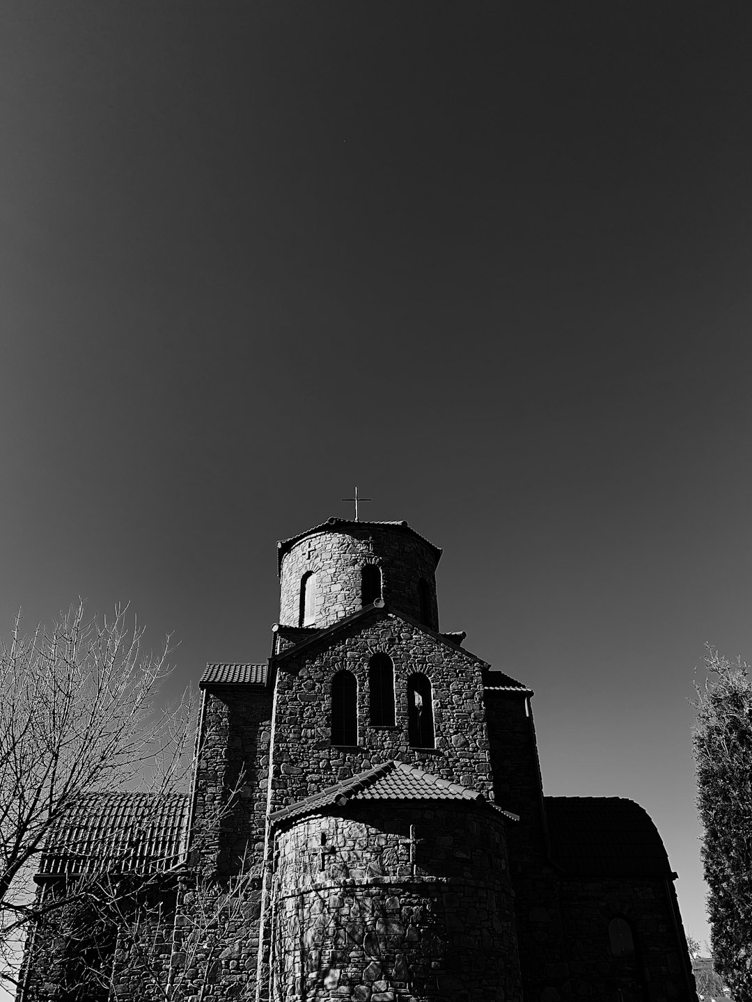 stone chapel grayscale photography