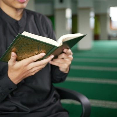 man reading book