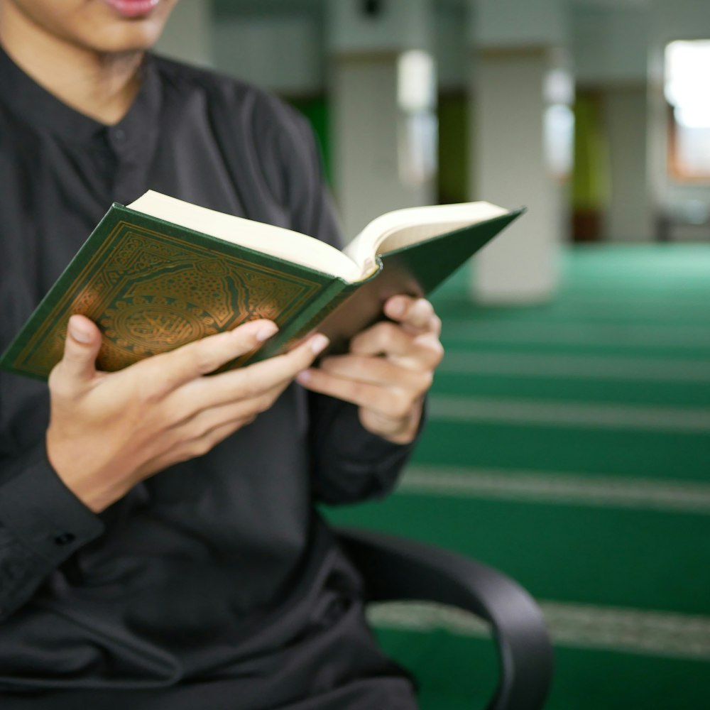 man reading book