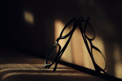 black framed eyeglasses thought-provoking google meet background