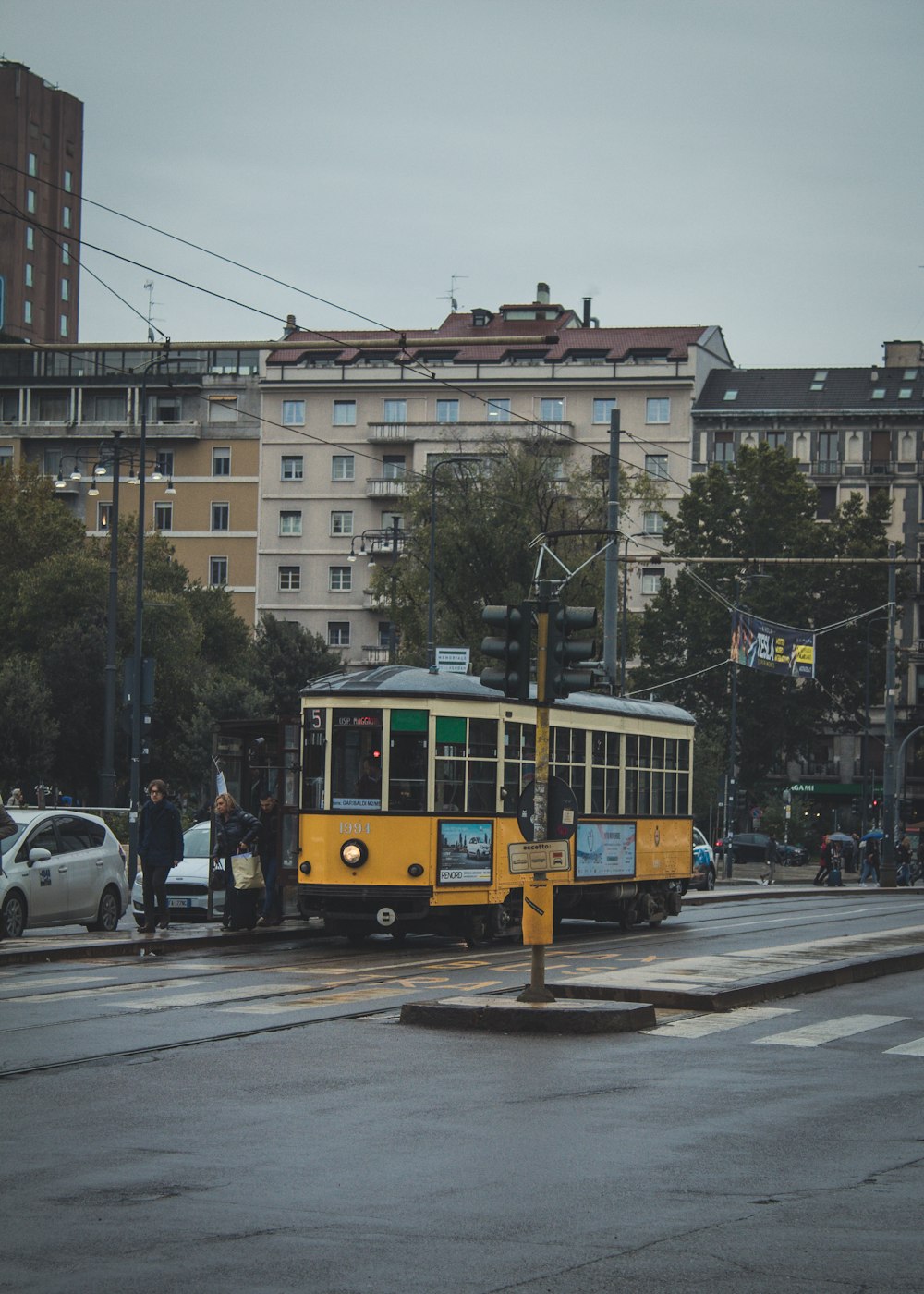 yellow tram during daytime