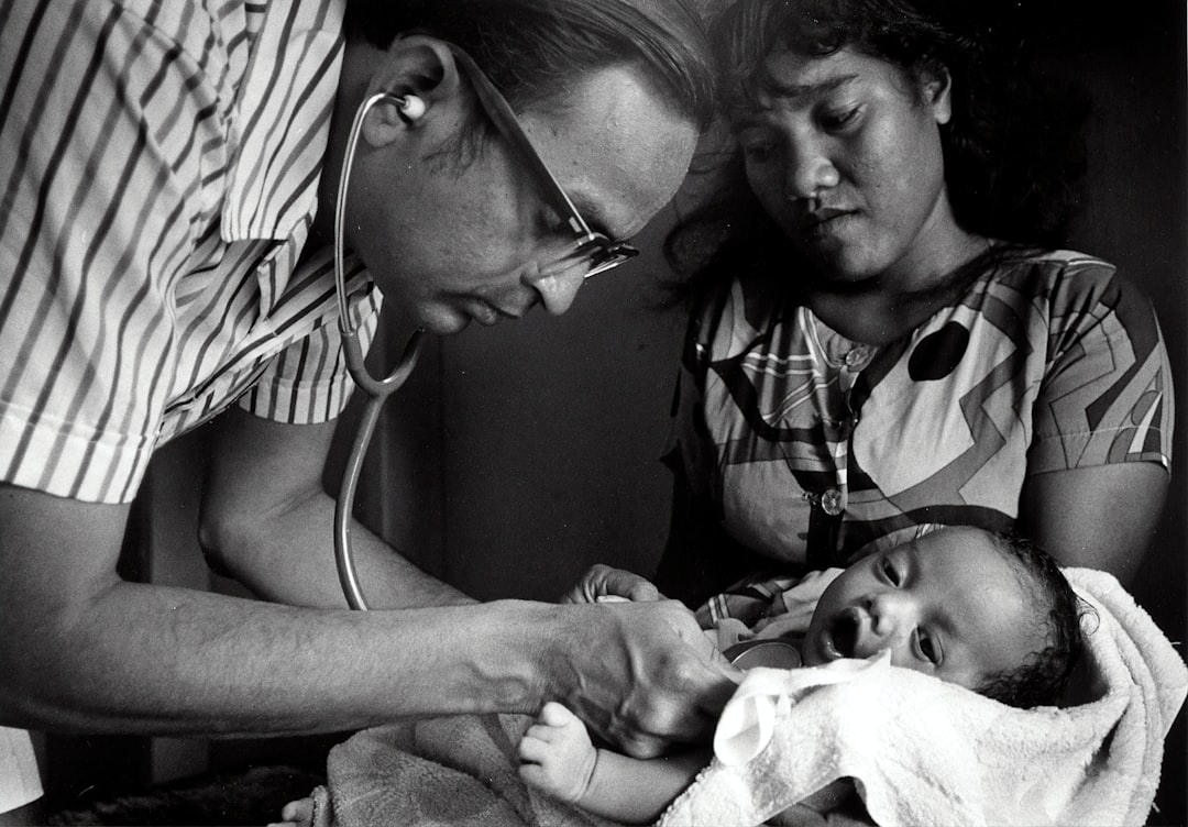 Medical team conducting annual medical examinations of Marshallese people who were exposed to radioactive fallout from an atmospheric nuclear weapons test in 1954