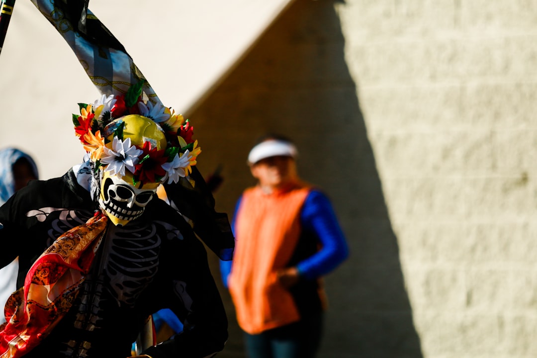 man wearing black and white skeleton costume