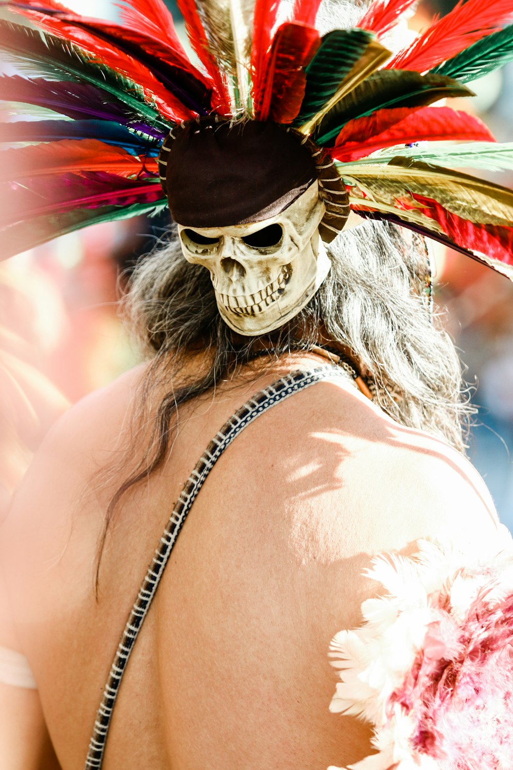 person with skull headdress