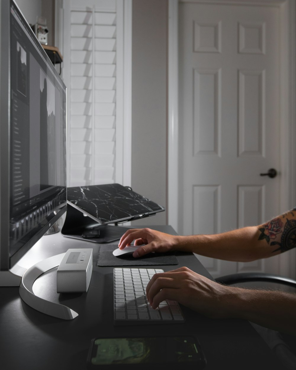 woman facing monitor