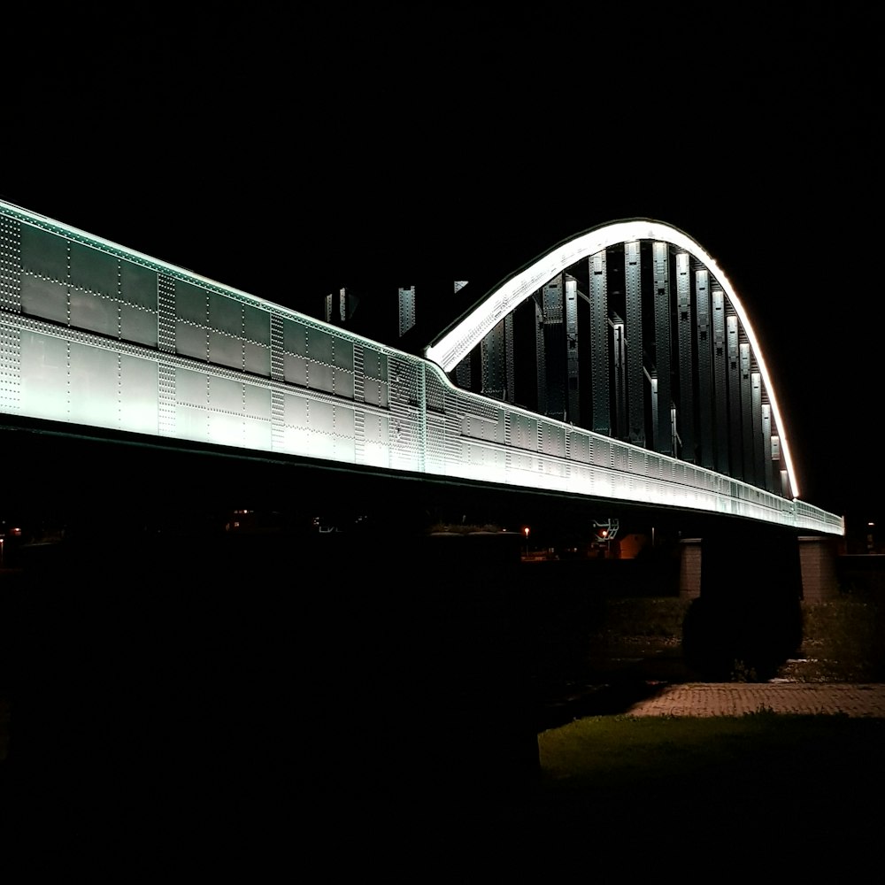 grey metal bridge at daytime