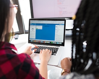 woman using MacBook Pro