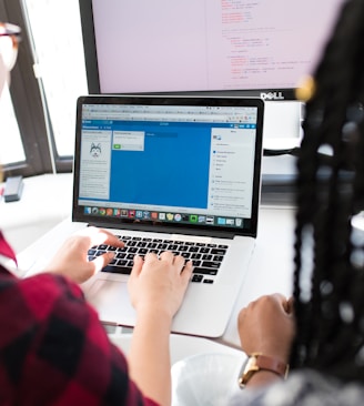 woman using MacBook Pro