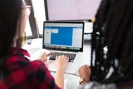 woman using MacBook Pro