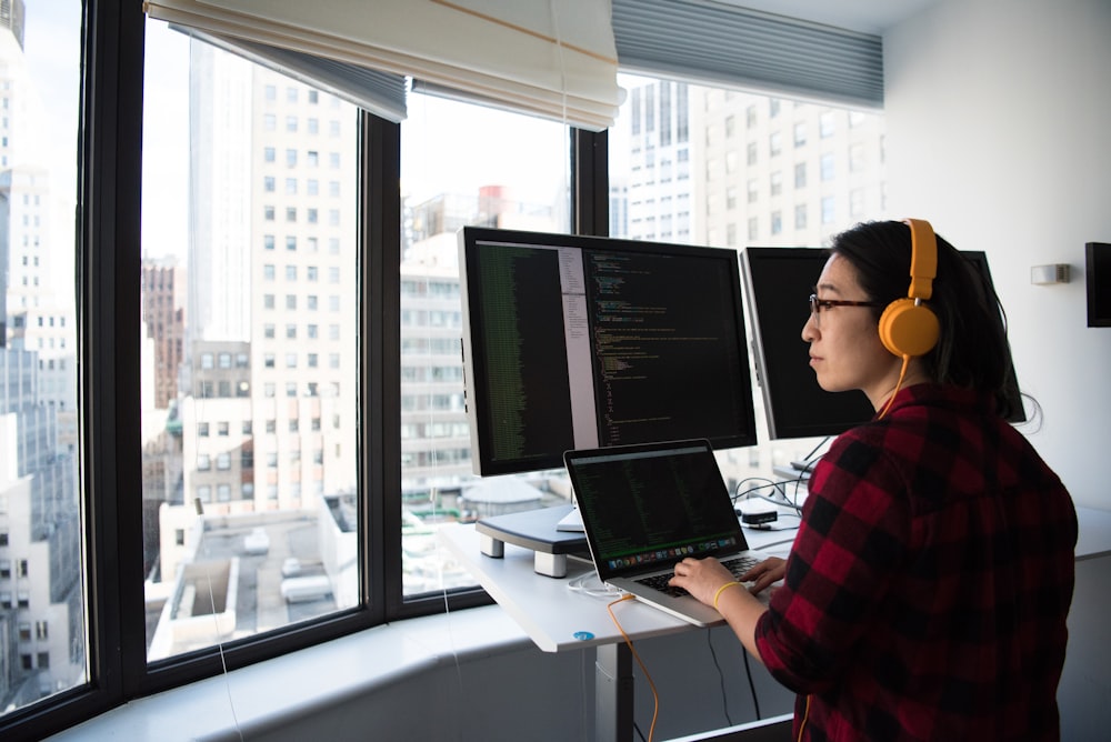 woman using MacBook Pro