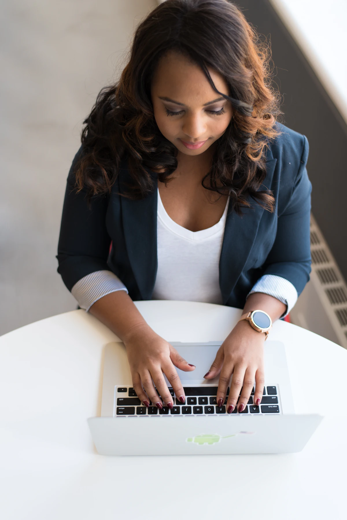 Black executive reviewing AI insight reports in an East African corporate setting