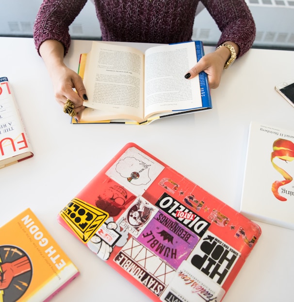 assorted-title books on table