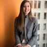 shallow focus photo of female startup founder in gray jacket