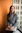 shallow focus photo of woman in gray jacket