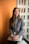 shallow focus photo of woman in gray jacket