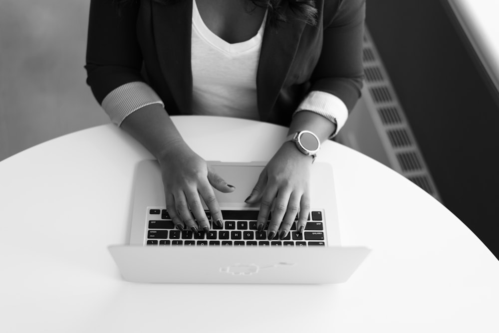 woman using MacBook