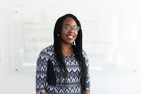 smiling woman wearing chevron top