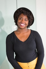 woman standing and smiling