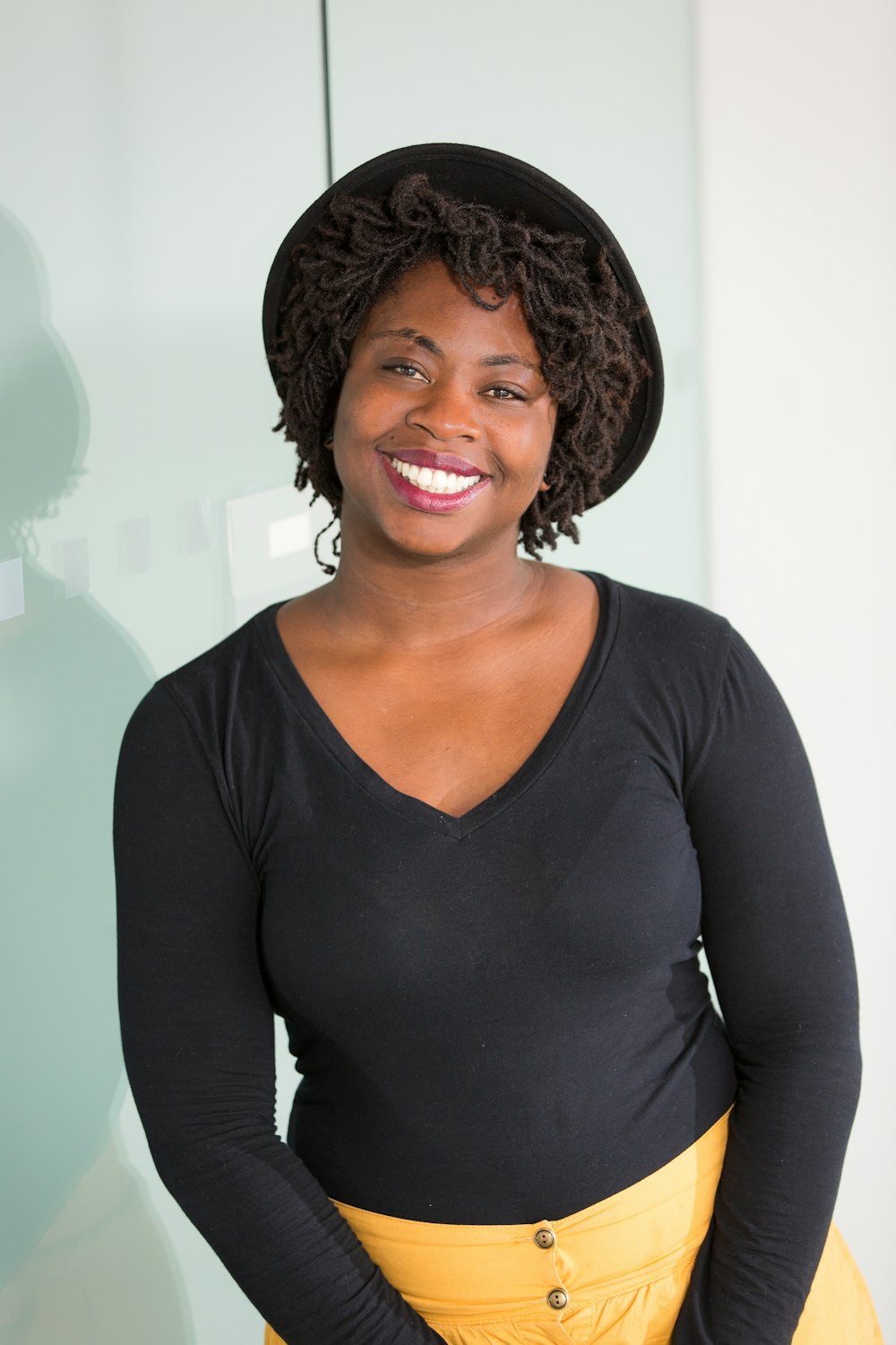 woman standing and smiling