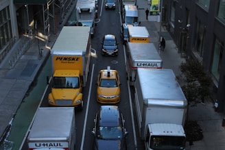 A reliable cargo truck on a city street, representing local freight transport.