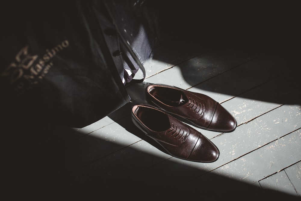 pair of black dress shoes