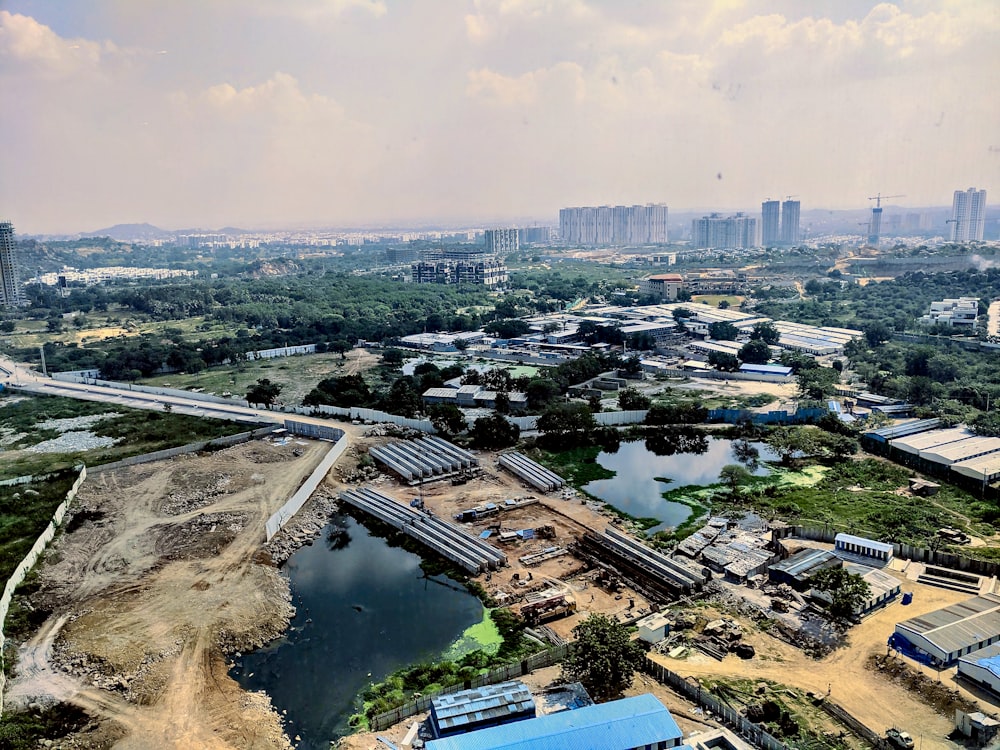 gray high rise buildings and body of water