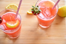 strawberry and lemon juice in highball glasses