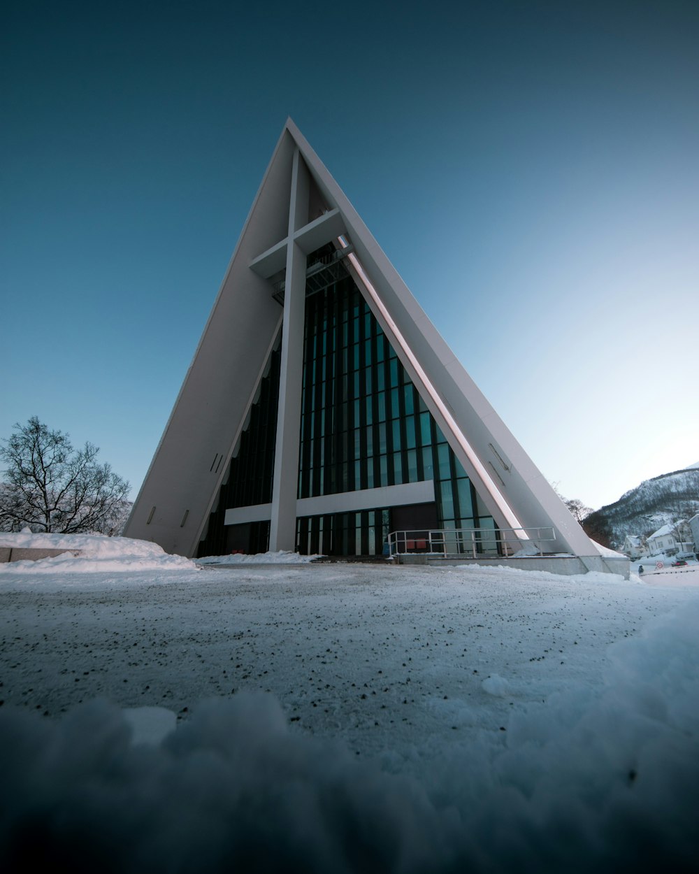 white wooden church under blue and white sky during daytime