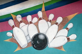 bowling ball crashing to bowling pins artwork
